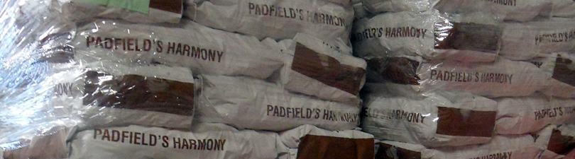 picture of warehouse at Wades And Ellie showing stock of Padfield's Harmony 25kg bags of potatoes shrink wrapped.